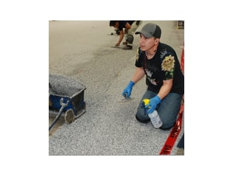 Continuing Hand Troweling the Stone